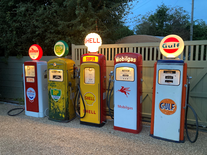 small gas pumps at night